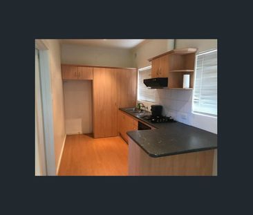 Located on a quiet tree lined street - Photo 2