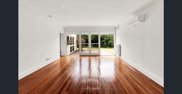 Impressive Executive Residence – Walk to the Beach! - Photo 1