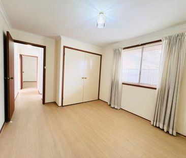 Spacious Family Home with Multiple Living Areas & Pool - Photo 5