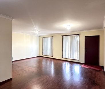Comfortable 3 Bedroom Home with Great Features & Secure Outdoor Living - Photo 1