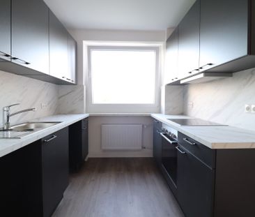 Modernes Flair in grüner Wohnanlage! - Foto 4