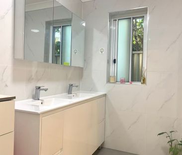 Spacious 4-Bedroom Family Home with Sunroom - Photo 3