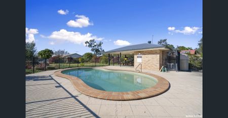 Caboolture *****Secure Resort Living - Pool - Tennis Court - BBQ Area***** - Photo 3