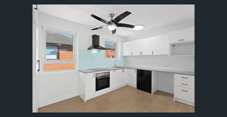 A Tastefully Updated Top Floor Apartment - Photo 3