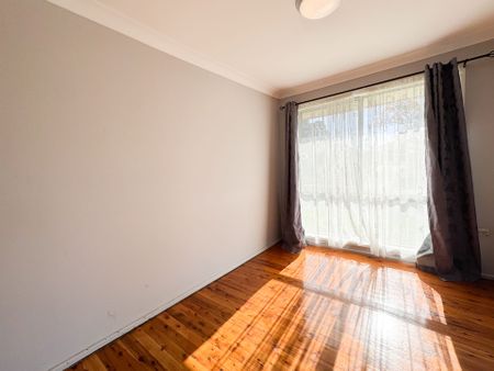 Peaceful Suburban Living in a Central, Well-Connected Location - Photo 5