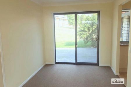 Practical 4-Bedroom Brick Home - Photo 3