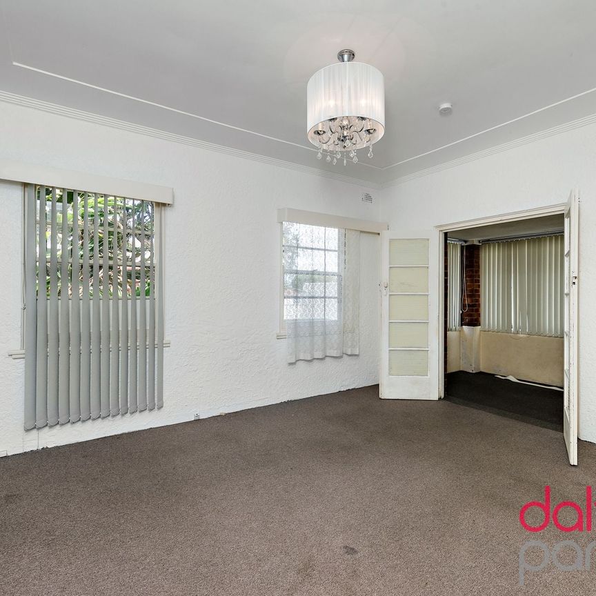 A four-bedroom home in a great Location - Photo 1