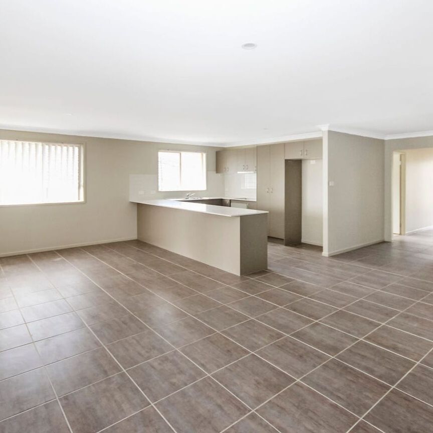 Spacious 4-Bedroom Home - Photo 1