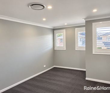Modern, Spacious & Freshly Painted Throughout! - Photo 3