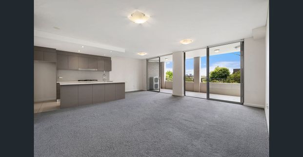 Spacious Three-Bedroom Apartment with Expansive Entertaining Balcony - Photo 1