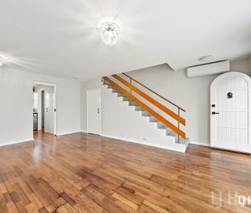 Fully Renovated Two-Bedroom Townhouse - Photo 2