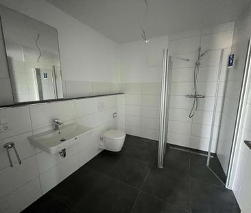 Modernes Wohnen - Exklusive DG-Wohnung in top Lage - Erstbezug - Photo 3