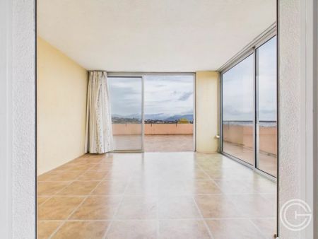 Location Appartement 4 pièces 77m² NICE 06200 - Photo 2