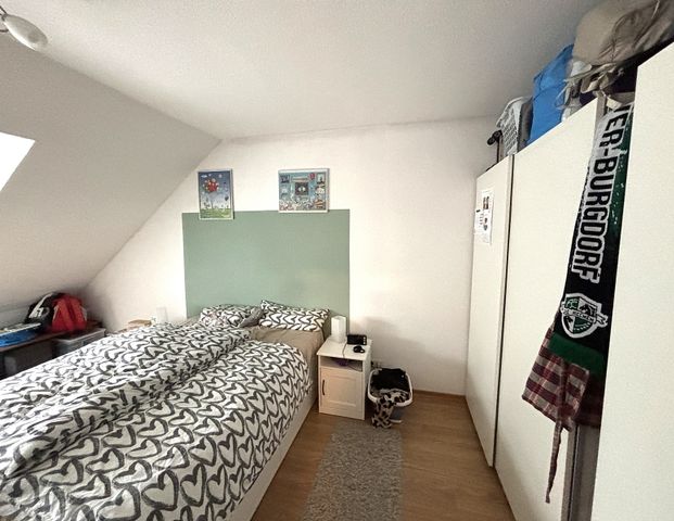 Helle Dachgeschosswohnung mit 3 Zimmern in ruhiger Lage von Alpheide! - Foto 1