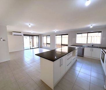 Modern Four Bedroom Home With Plenty of Room ! - Photo 3