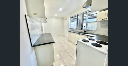 COSY 4 BEDROOM RENOVATED HOME - Photo 5