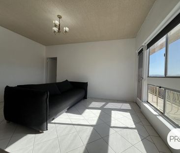 Comfortable Two-Bedroom Unit in a Convenient Location - Photo 1