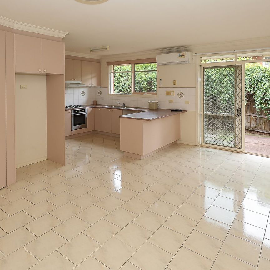 Conveniently located three bedroom home - Photo 1