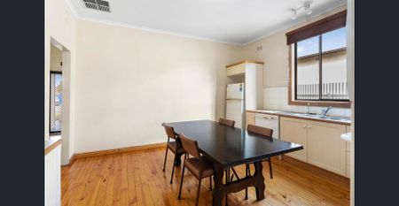 Spacious 3-Bedroom Home with Large Yard & Multiple Living Areas - Photo 2