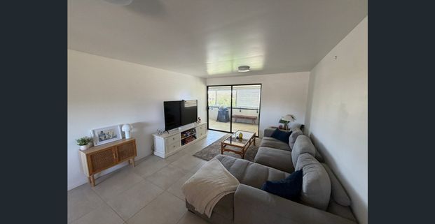 For Rent: Spacious Partially Furnished 2-Bedroom Unit in the heart of Forest Lake - Photo 1