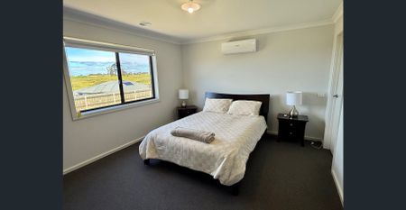 Relaxed Coastal Living in a Family-Friendly Location - Photo 2