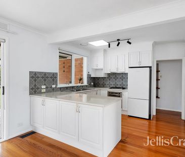 Stylish Family Home with Modern Bathroom & Spacious Living - Photo 2