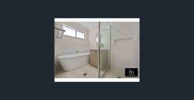 NEAR NEW 4 BEDROOM MODERN FAMILY HOME - Photo 1