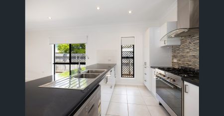 Refreshed Family Home - New Paint - New Carpet - Media Room or 5th Bedroom - Photo 4