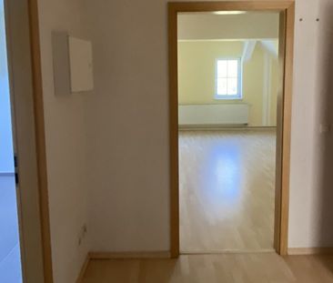 Gemütliche Zweiraumwohnung im Dachgeschoss mit Gartennutzung - Foto 1