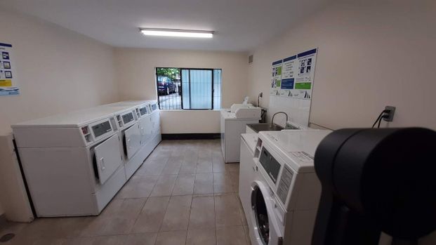 Downtown Apartment Building - Photo 1