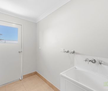 Stylish, Spacious, and Set to Impress - Welcome to 28 Liriope Drive! - Photo 3