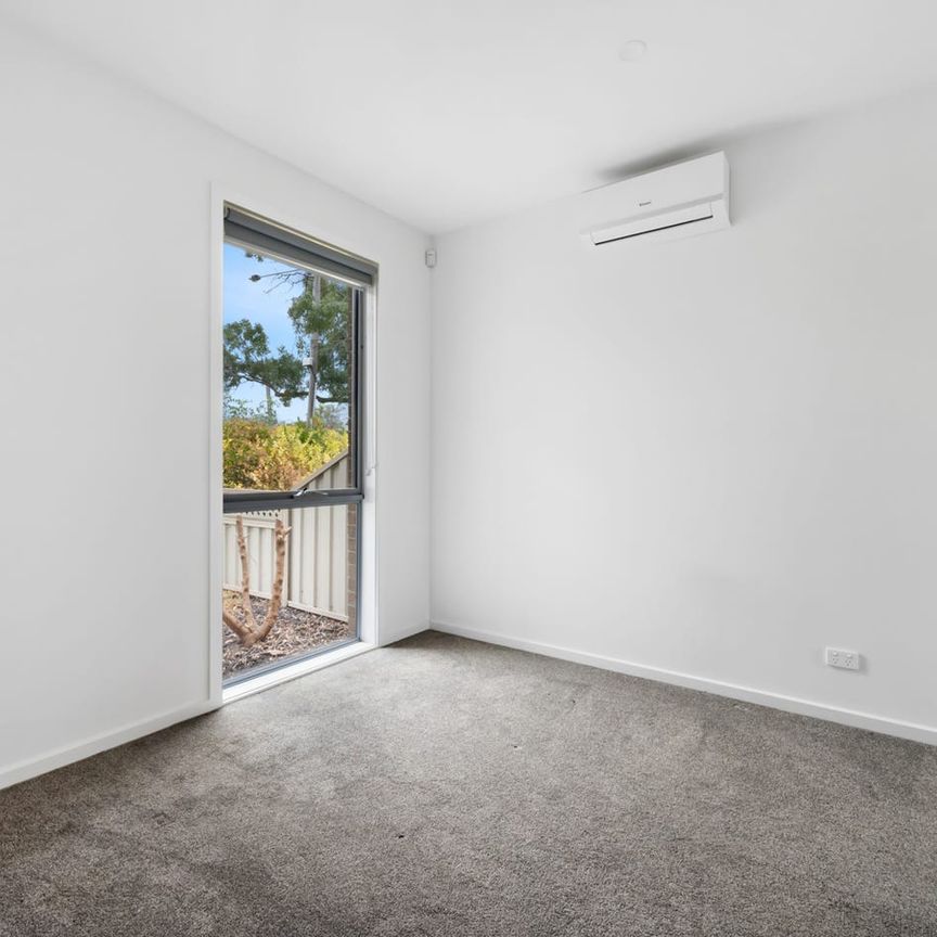 Stylish, Spacious Living with Modern Comfort Across Two Levels - Photo 1