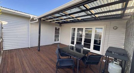 Tidy 3-Bedroom Home with Great Indoor-Outdoor Flow - Photo 2