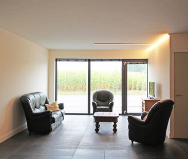 Ruim, gelijkvloers appartement met 2 slaapkamers, terras en een aut... - Foto 4