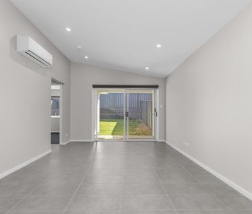 Brand New Four-Bedroom Duplex! - Photo 1