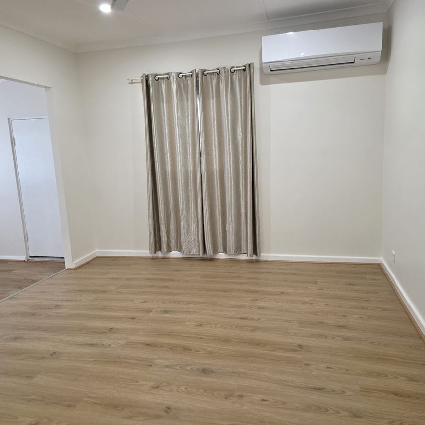 Renovated 2-Bedroom Home – Border of Beachlands Primary, Very Close to the Ocean - Photo 1