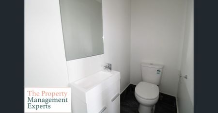 Spacious Four-Bedroom Family Home in a Prime Location! - Photo 2