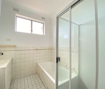 Two-Bedroom Unit with Lockup Garage - Photo 2