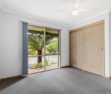 Charming Three-Bedroom House with a Huge Shed! - Photo 4