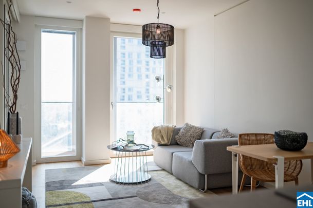Stylische 1,5-Zi.-Wohnung mit Loggia & Rooftop Pool | TOWER HOMES im V22 - Foto 1