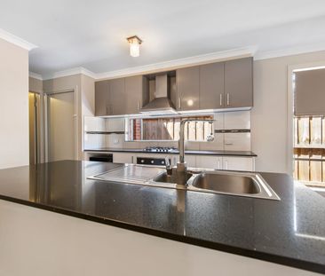 FAMILY HOME IN EXTREME PROXIMITY TO TRAIN STATION! - Photo 6