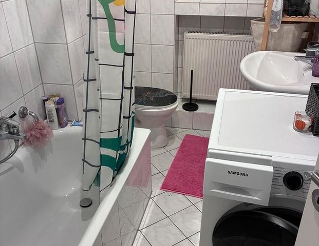 Helle 1-Zimmer-Dachgeschosswohnung in Harheim - Foto 1