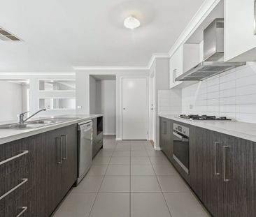 4-Bedroom Family Home with Modern Comforts - Photo 4