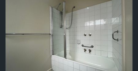 Bright 2-Bedroom Unit with Private Courtyard, Carport & Storeroom - Photo 5