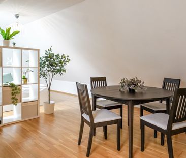 Charmante Dachgeschosswohnung in ruhiger Lage - Photo 1