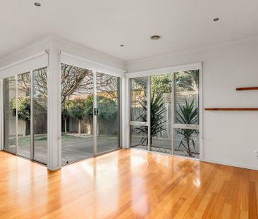 Light-Filled Three-Bedroom Home with Private Courtyard - Photo 3
