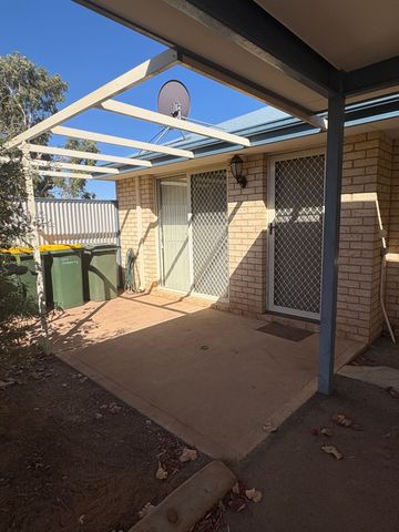 Tidy Unit in a Gated complex with sparkling pool! - Photo 2