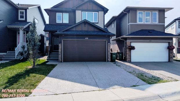 SPACIOUS 3 BED, 2.5 BATH, 2 STOREY SF HOME & DBL ATTACHED GARAGE IN THE COMMUNITY OF EVANSTON - Photo 1
