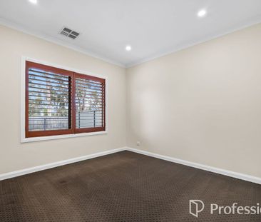 Beautiful Family Home with Multiple Living Zones & Modern Comforts! - Photo 6