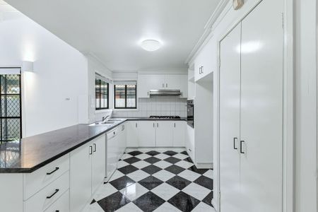 Light-Filled Family Home with 2 Living Spaces in Prime Altona Meadows Location - Photo 5